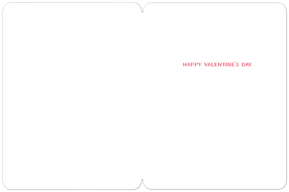 Inside of a white Valentine's Day card, blank except for the phrase "HAPPY VALENTINE'S DAY" printed in red in the upper right corner.