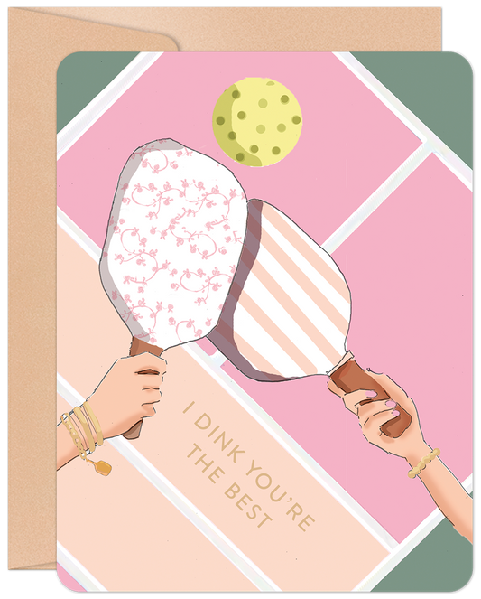 A vibrant greeting card featuring two hands holding pickleball paddles and a ball, with the text 'I DINK YOU'RE THE BEST' on a pink court.