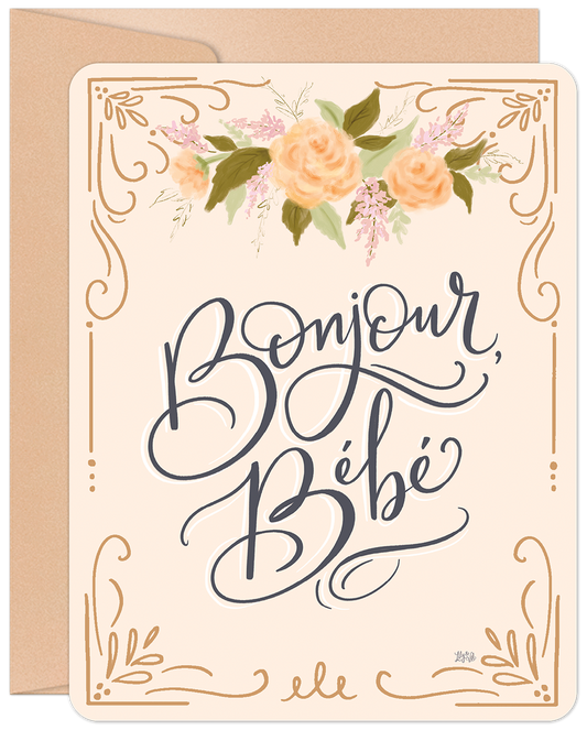 Front of a new baby greeting card, "Bonjour, Bébé" in elegant script with delicate peach floral illustrations on a cream background.