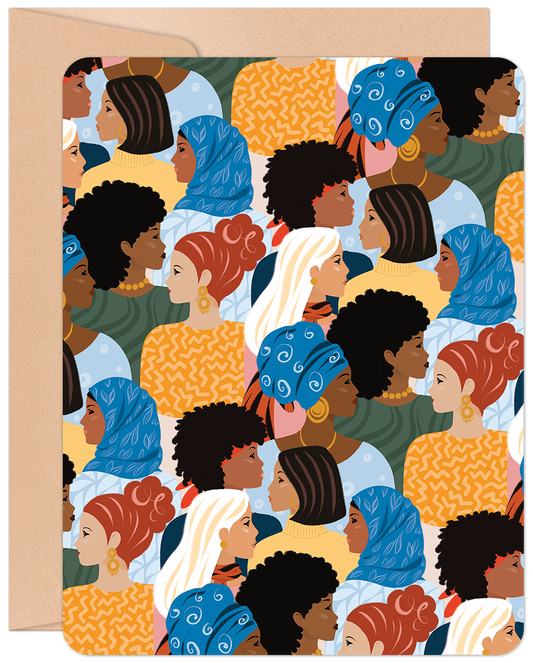 Front of a blank greeting card featuring a vibrant, diverse pattern of women with various skin tones and hair styles, on a kraft paper background.