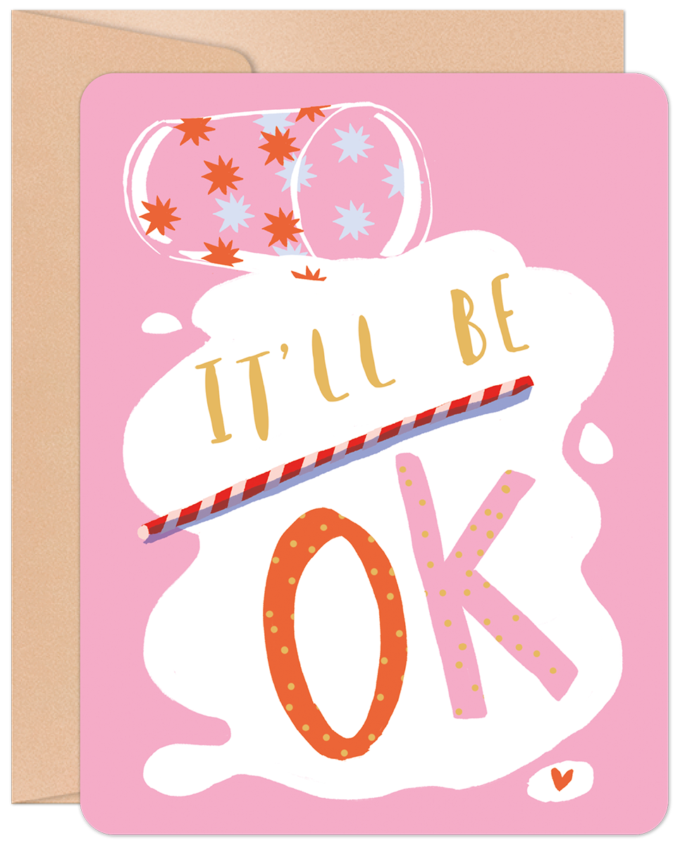 Front of a pink encouragement card featuring a whimsical spilled drink illustration with 'IT'LL BE OK' in playful yellow and orange letters.