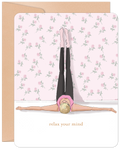 Encouraging greeting card with a woman in a legs-up-the-wall yoga pose against a pink floral wallpaper, featuring the text 'relax your mind'. Perfect for self-care and wellness encouragement.