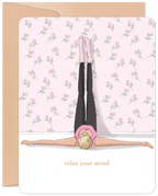 Encouraging greeting card with a woman in a legs-up-the-wall yoga pose against a pink floral wallpaper, featuring the text 'relax your mind'. Perfect for self-care and wellness encouragement.