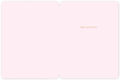 Inside of a light pink greeting card, blank on the left, with 'take care of you.' text on the right side.