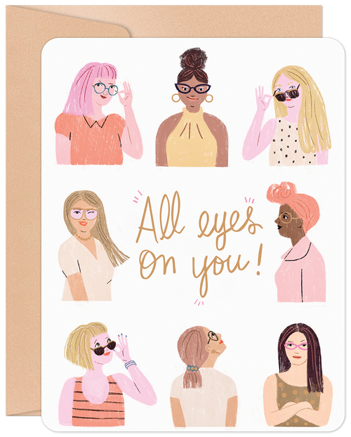 Front of 'All Eyes On You' greeting card for a woman's new job, featuring diverse women wearing glasses and sunglasses with an encouraging message for a friend or coworker.