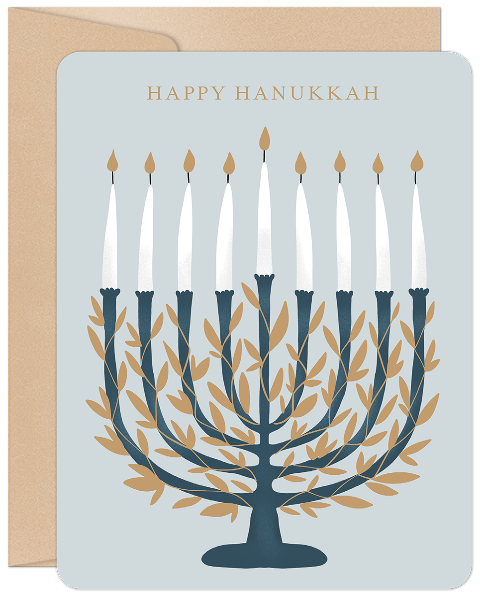 Elegant Hanukkah greeting card front featuring a teal and gold leaf menorah with nine lit candles, 'HAPPY HANUKKAH' text, and a matching envelope on a light blue background.