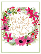 Front of a watercolor greeting card featuring a festive wreath of red poinsettia-like flowers, green leaves, and red berries, surrounding gold script text 'Merry and bright wishes'. Ideal for holiday season greetings.