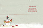 Inside of a lighthearted greeting card showing a cheerful snowman and red cardinals, with the message 'MAY ALL HEARTS BE HAPPY AND FULL OF GOOD CHEER AS WE CELEBRATE THIS SEASON AND AWAIT THE COMING YEAR!' against a rustic snowy background.