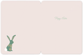 Open greeting card for Easter featuring a charming green bunny with yellow floral patterns and a white fluffy tail on the left, and 'Happy Easter' in elegant green script on the right, all set against a soft, pale pink background. Ideal for children and springtime greetings.