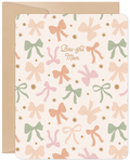 Elegant Mother's Day greeting card featuring a charming pastel bow pattern in pink, green, and peach, with 'Bow-tiful Mom' text on the front, accompanied by a kraft envelope.
