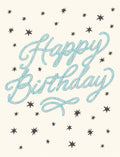 Front of a lighthearted birthday greeting card featuring 'Happy Birthday' in a textured blue rope font, scattered with playful dark grey stars on a cream background.