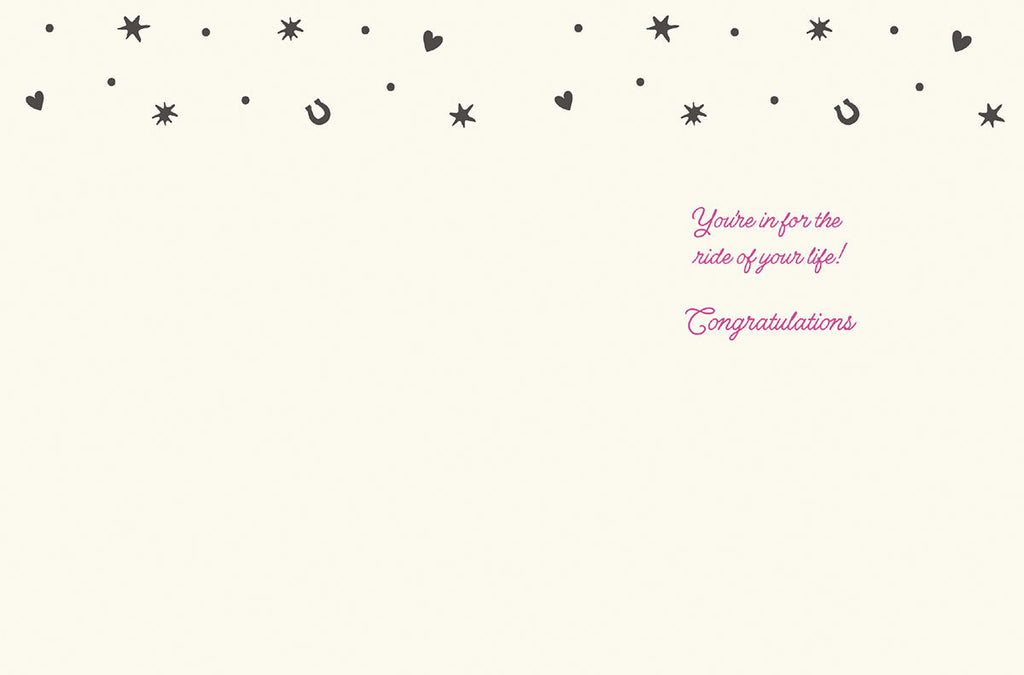 Interior of a lighthearted cowgirl bridal card showing 'You're in for the ride of your life! Congratulations' in elegant pink script. The inside mirrors the front's playful motif with subtle horseshoes, hearts, and stars along the top edge, offering a sweet message for the soon-to-be Mrs.