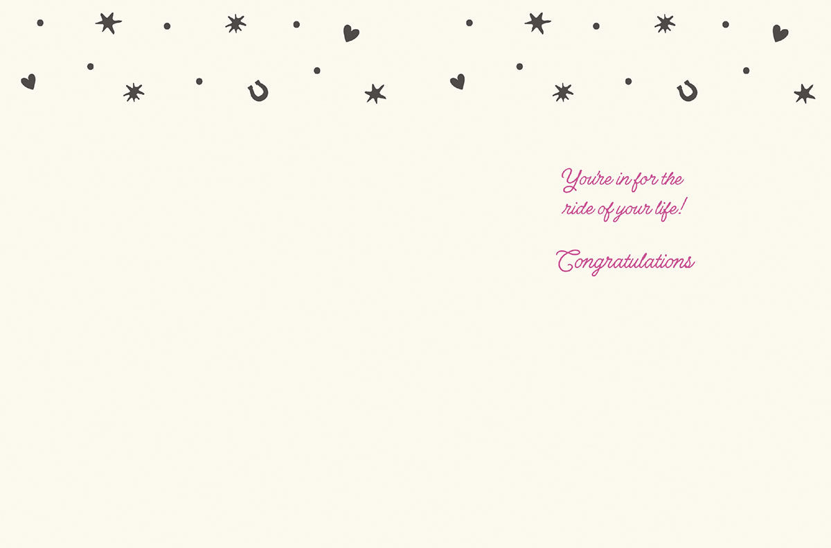 Interior of a lighthearted cowgirl bridal card showing 'You're in for the ride of your life! Congratulations' in elegant pink script. The inside mirrors the front's playful motif with subtle horseshoes, hearts, and stars along the top edge, offering a sweet message for the soon-to-be Mrs.