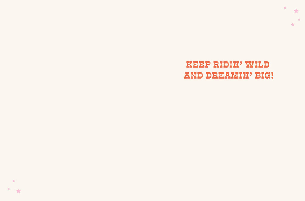 Interior of a vibrant encouragement card for horse lovers, displaying inspiring message 'KEEP RIDIN' WILD AND DREAMIN' BIG!' with small star accents.