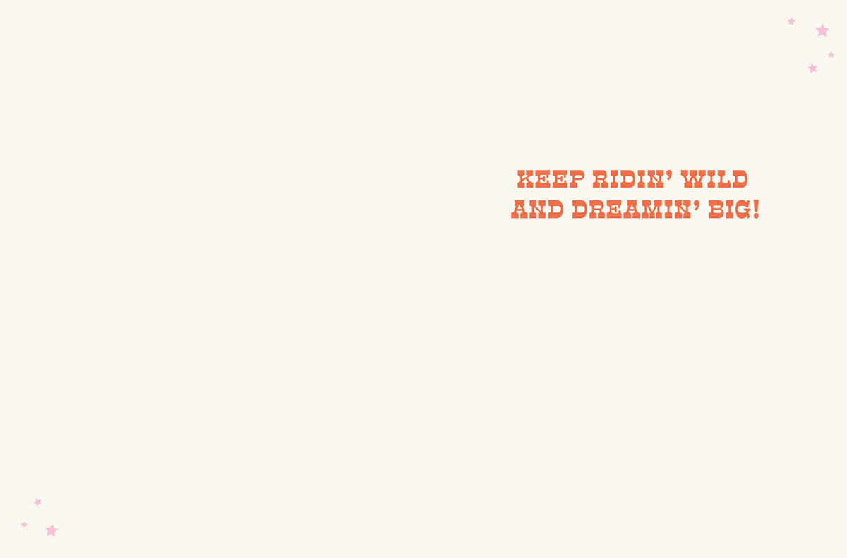 Interior of a vibrant encouragement card for horse lovers, displaying inspiring message 'KEEP RIDIN' WILD AND DREAMIN' BIG!' with small star accents.