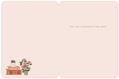 Inside of a graduation card, light pink, with 'YOU ARE LITERARILY THE BEST!' text and small book and rose illustrations.