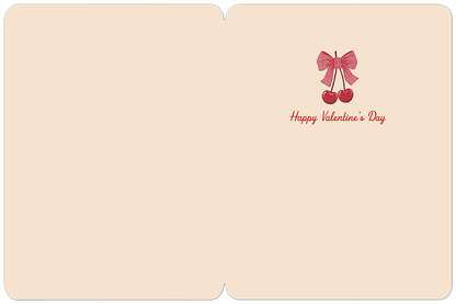 Inside view of a sweet Valentine's Day card with 'Happy Valentine's Day' text and a small cherry and bow illustration.