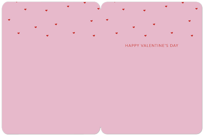 Inside of a pink Valentine's Day card with red hearts and 'Happy Valentine's Day' message on the top right.