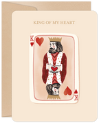 Romantic greeting card featuring a stylized King of Hearts playing card with a beard and crown, holding a heart, with the text 'KING OF MY HEART' at the top, on a light beige background with an envelope visible behind.