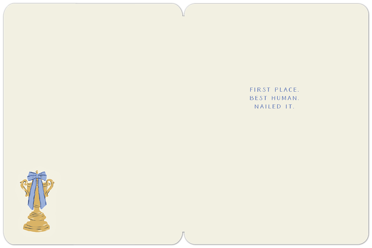 Inside of a congratulatory greeting card with text 'FIRST PLACE. BEST HUMAN. NAILED IT.' on the right, and a small blue-ribboned trophy illustration on the left, perfect for an exceptional pal.