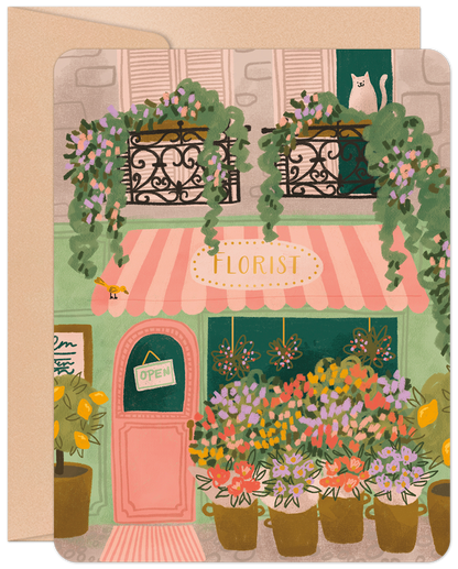 Charming illustration of a vibrant Parisian florist shop with an "OPEN" sign, potted flowers, lemon trees, a cat, and a small bird.