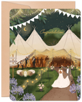 Illustrated wedding greeting card featuring a lively outdoor celebration with tipis, string lights, a band, and a dancing couple in a rustic setting with purple flowers, perfect for conveying heartfelt congratulations.