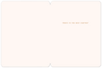 Inside of a blank greeting card with a simple message 'HERE'S TO THE NEXT CHAPTER!' in the upper right corner, ready for a personalized note.