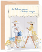 Front of a heartfelt greeting card for her friend. Features an elegant illustration of two women in stylish wide-brimmed hats and summer outfits, surrounded by blue and yellow flowers. Text reads: 'You'll always have me. I'll always have you.'