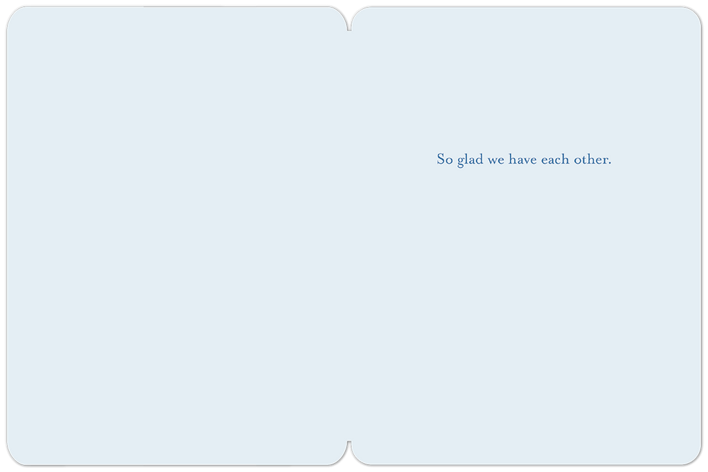 Interior view of a thoughtful greeting card for a dear woman, displaying the warm blue text 'So glad we have each other.' on a serene light blue background, ready for a personal handwritten note.