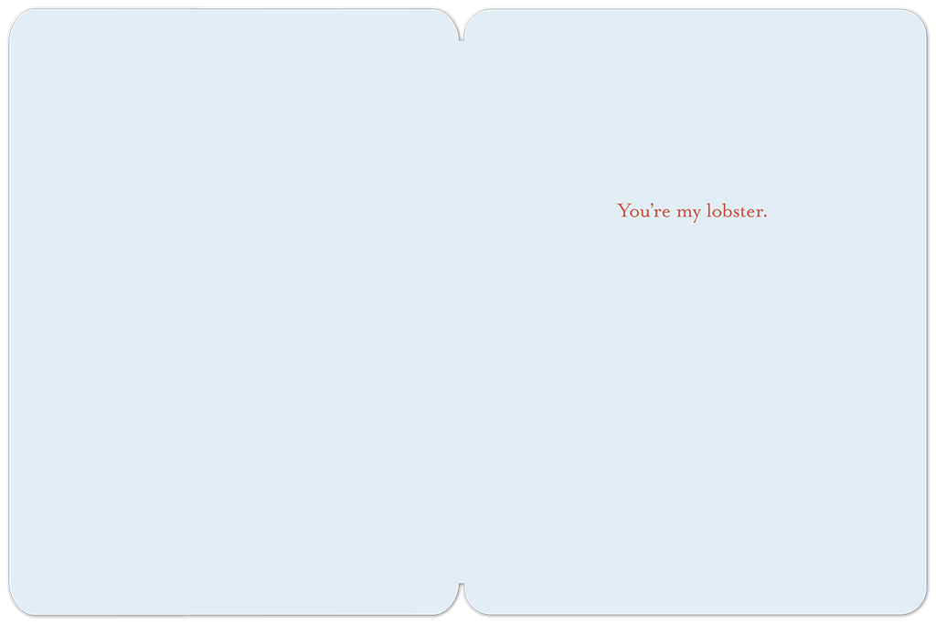 Inside of a light blue greeting card with the text "You're my lobster." in a rustic red font on the right side.