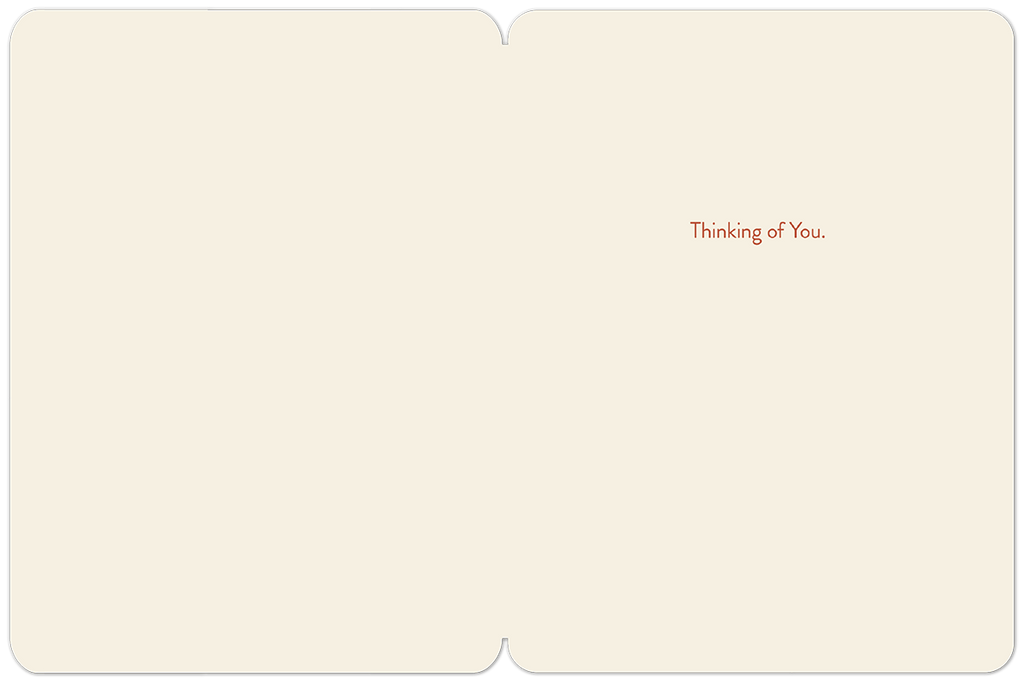 Open cream-colored greeting card interior with ample blank space for a personal message, displaying a subtle 'Thinking of You.' sentiment in a warm brown font on the right side.