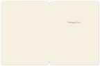 Open cream-colored greeting card interior with ample blank space for a personal message, displaying a subtle 'Thinking of You.' sentiment in a warm brown font on the right side.