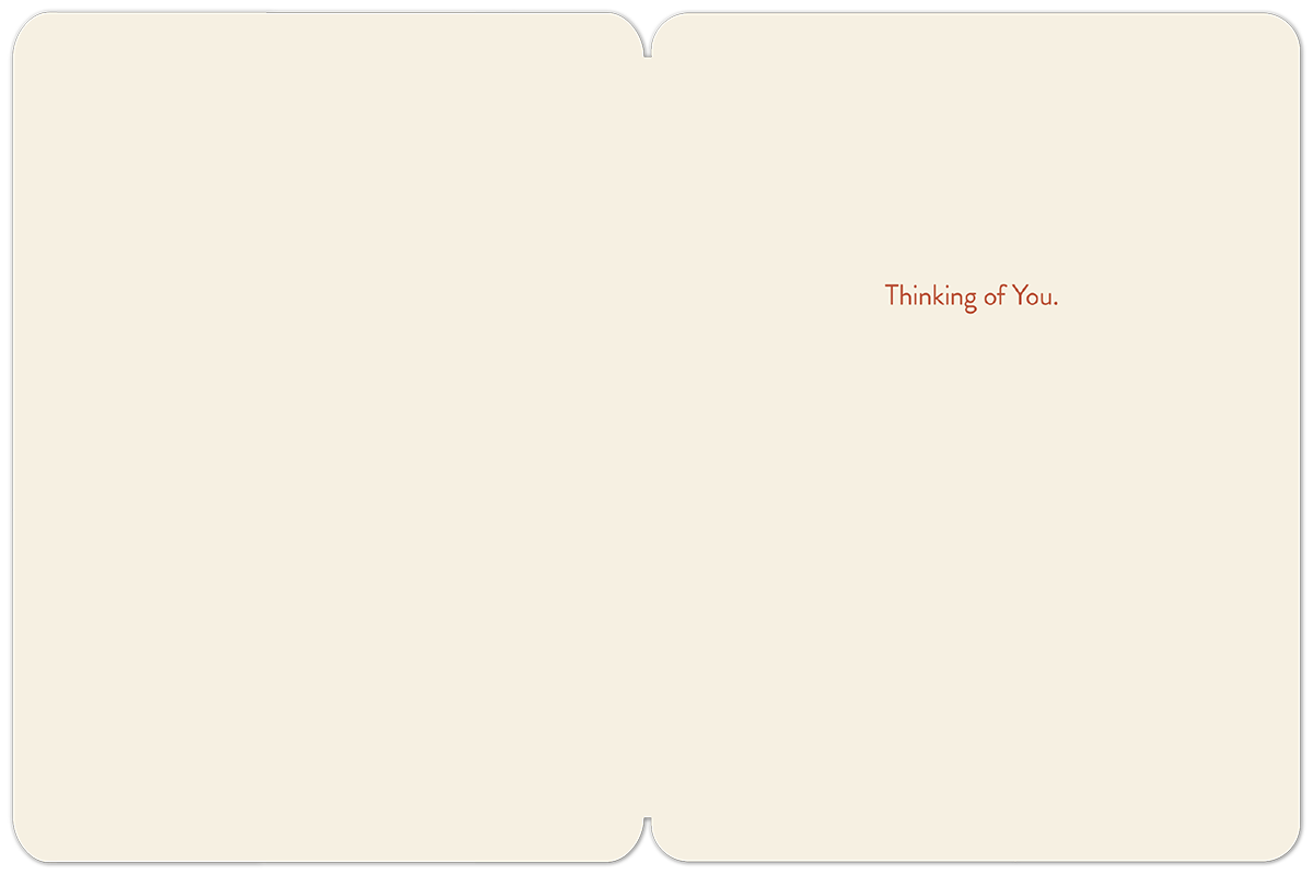 Open cream-colored greeting card interior with ample blank space for a personal message, displaying a subtle 'Thinking of You.' sentiment in a warm brown font on the right side.