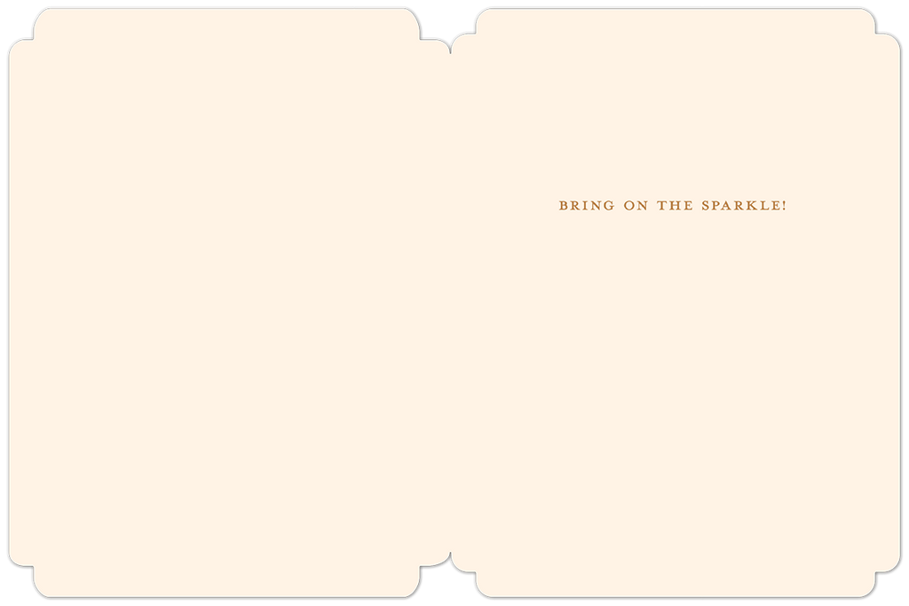 Interior of a sophisticated holiday card displaying 'BRING ON THE SPARKLE!' in gold lettering on a smooth cream background, ready for personal messages.