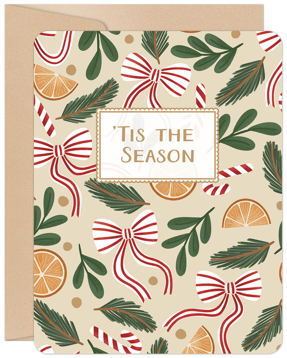 Lighthearted festive greeting card featuring a pattern of red and white candy cane bows, green evergreen sprigs, and orange slices on a cream background, with 'Tis The Season' in a decorative frame.