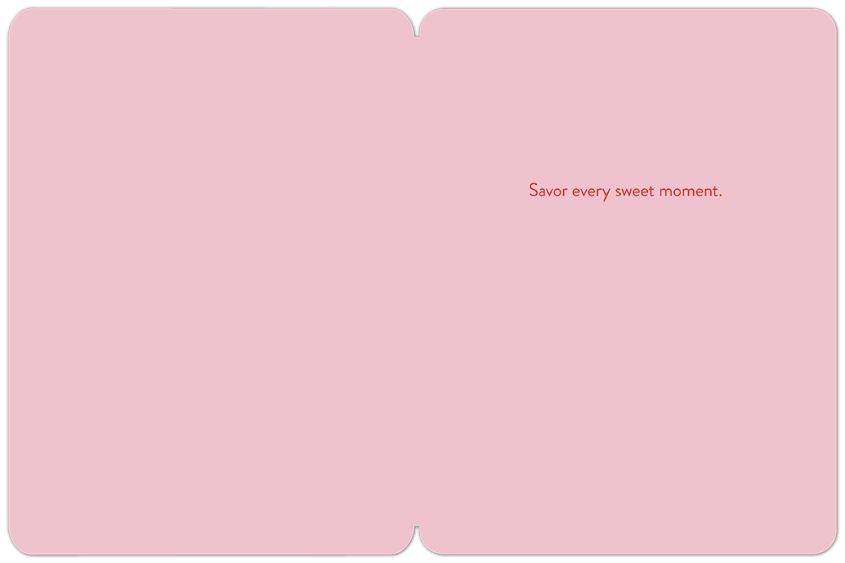 Inside of a pink greeting card with the message 'Savor every sweet moment.' in red script.