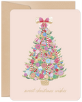 Gourmet candy decorated evergreen tree on a blush pink greeting card with 'sweet christmas wishes' text, perfect for sending season's greetings.