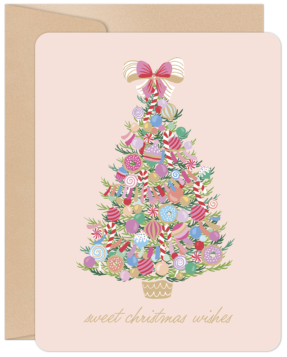 Gourmet candy decorated evergreen tree on a blush pink greeting card with 'sweet christmas wishes' text, perfect for sending season's greetings.