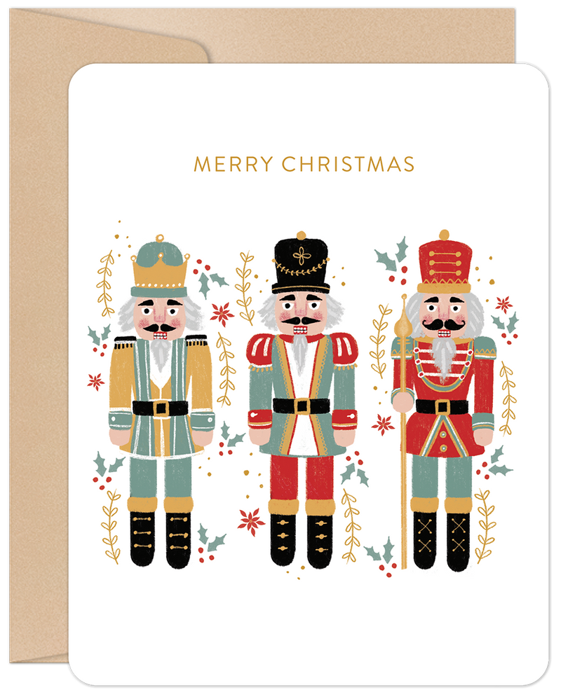 Front of a festive holiday greeting card featuring three colorful nutcracker soldiers in red, green, and gold uniforms, surrounded by sprigs of holly and red berries, with 'MERRY CHRISTMAS' text above. Ideal for general holiday wishes.