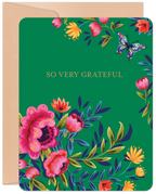 Vibrant green greeting card featuring an abundant floral design with pink peonies, orange and yellow flowers, and a colorful butterfly, with 'SO VERY GRATEFUL' in elegant gold text, accompanied by a kraft brown envelope.