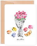 Watercolor art greeting card featuring a bouquet of pink roses, colorful macarons, a croissant, and 'merci' script, perfect for sending thanks.